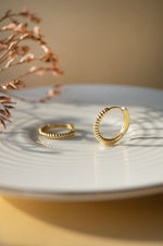 Twisting Glam Gold Plated Sterling Silver Hoop Earrings